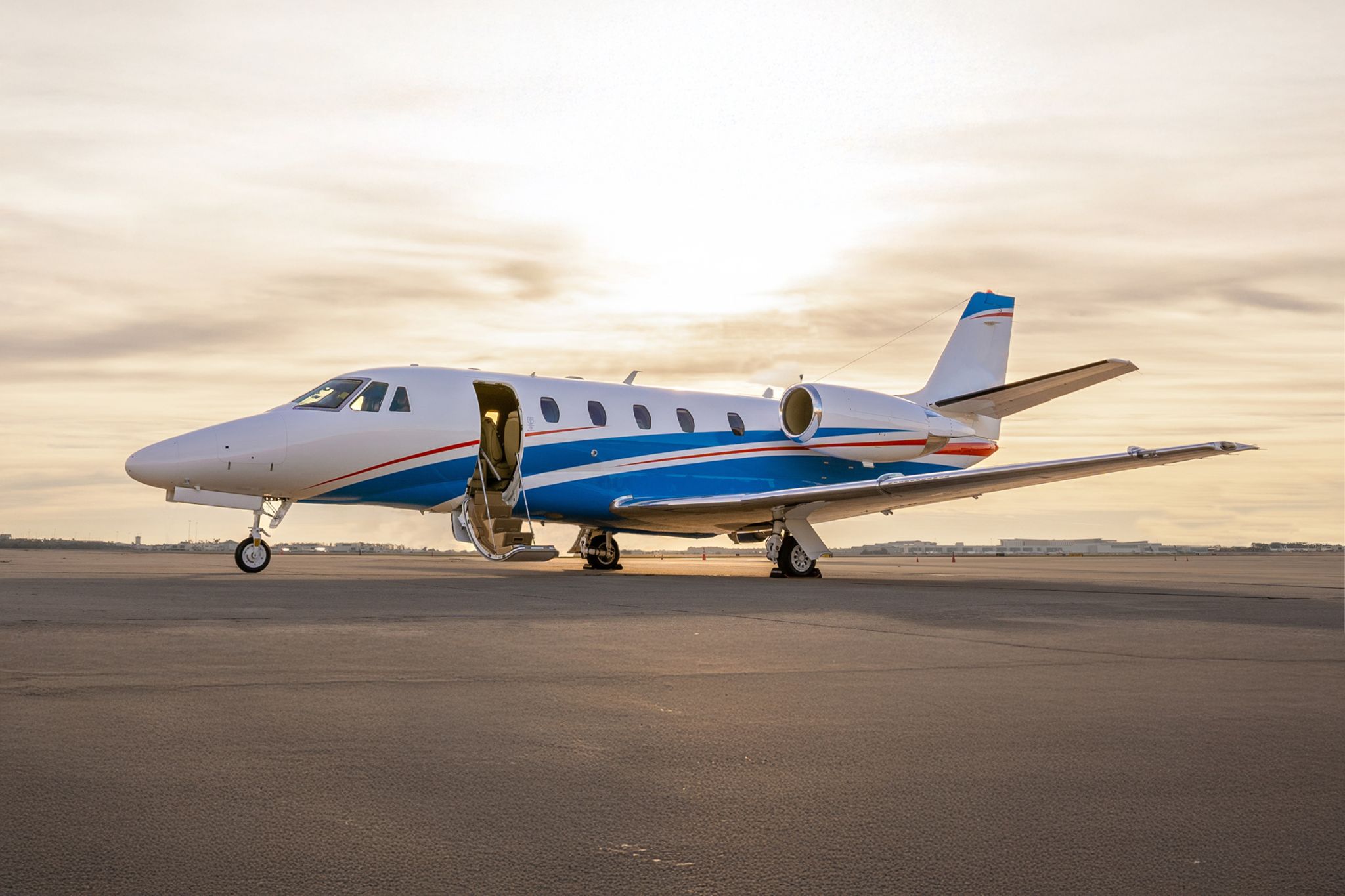 A Fly Alliance Citation XLS Gen2 on the ramp at sunset